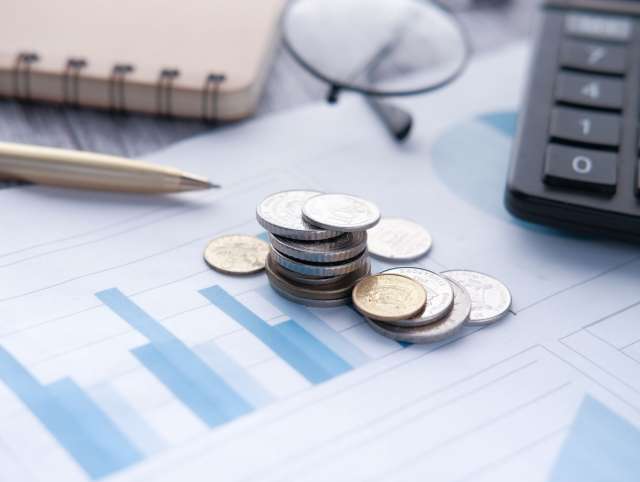 stack-of-coins-financial-graph-calculator-and-no-2024-12-10-04-27-47-utc